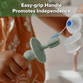 haakaa 360° Baby Toothbrush with Suction Base - Gentle Cleaning for Infant Self-Brushing Training, Food-Grade Silicone, Adjustable Safety Shield -