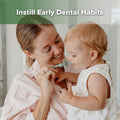 haakaa 360° Baby Toothbrush with Suction Base - Gentle Cleaning for Infant Self-Brushing Training, Food-Grade Silicone, Adjustable Safety Shield -