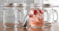 Glaver's Mason Jar 16 Oz. Glass Mugs with Handle and Lid Set Of 4 - Home Essentials & Beyond - Old Fashioned Drinking Glass Bottles Original Mason