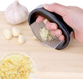 Garlic Press Rocker Stainless Steel Ginger Crusher Squeezer Kitchen Gadget with Ergonomic handle, Silicone Tube Garlic Peeler and Cleaning Brush
