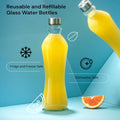 Joyjolt Glass Water Bottles - 2Pc Set, 32 Oz/1 Liter, Clear Glass with Stainless Steel Lids, Leakproof, Ideal for Juicing or Iced Tea