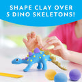 NATIONAL GEOGRAPHIC Clay Dinosaur Arts & Crafts Kit - Dinosaur Air Dry Clay for Kids with 5 Clay Colors, 5 Dino Skeletons & Googly Eyes, Dinosaur