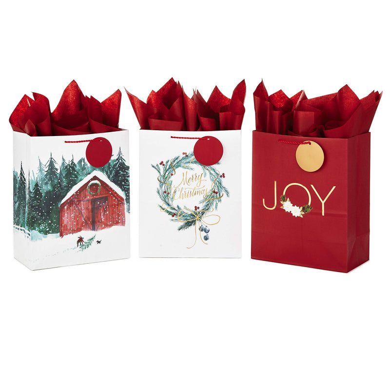 Hallmark 13" Large Christmas Gift Bag Assortment with Tissue Paper (3 Bags: "Merry Christmas" Wreath, Gold Joy, Snowy Red Barn) Red, White, Gold