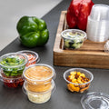 Amazon Basics Disposable Plastic To-Go Cups and Lids, Mini, 2oz, 50 Count, BPA Free, for Condiment, Salad Dressing, Sauces, Jello Shots 2 Ounces